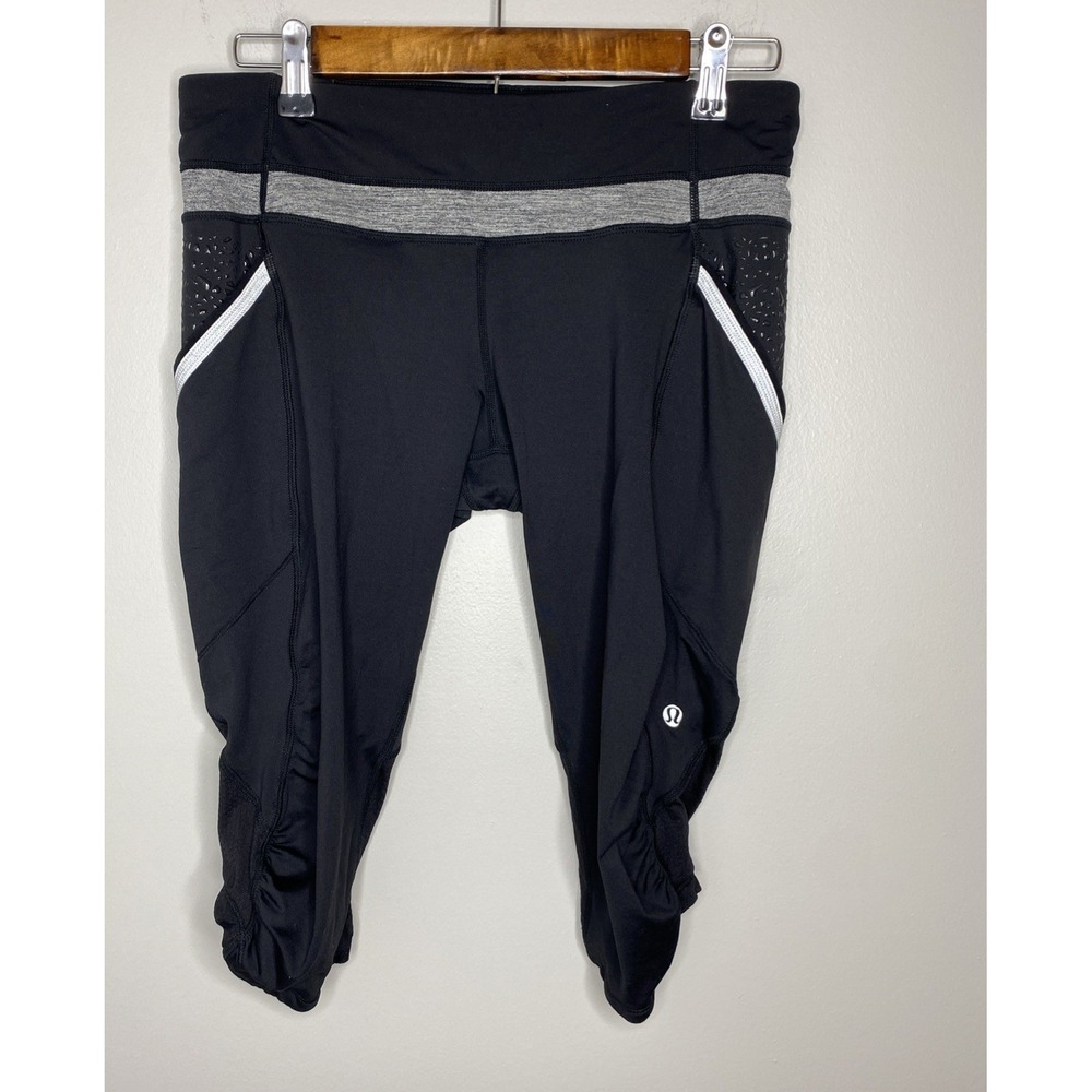 Lululemon Run a Marathon Crop Pant Size 10 Black Side Pockets Reflective Stripes